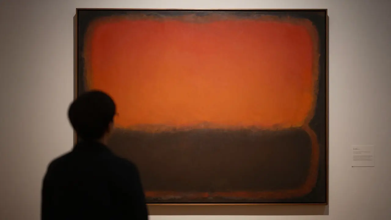 Viewer immersed in a large Rothko-style color field painting